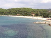 The impressive beach Tristinikouda with trees, sand and turquoise waters