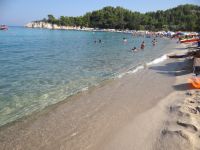 Thick sand and crystal clear waters on the Armenistis beach in Sithonia, Chalkidiki