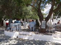 Visitors can find shadow from the trees and good food in Kontarini Square in Chora, Folegandros