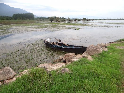 A simple, traditional wooden boat at the small port in Mandraki village